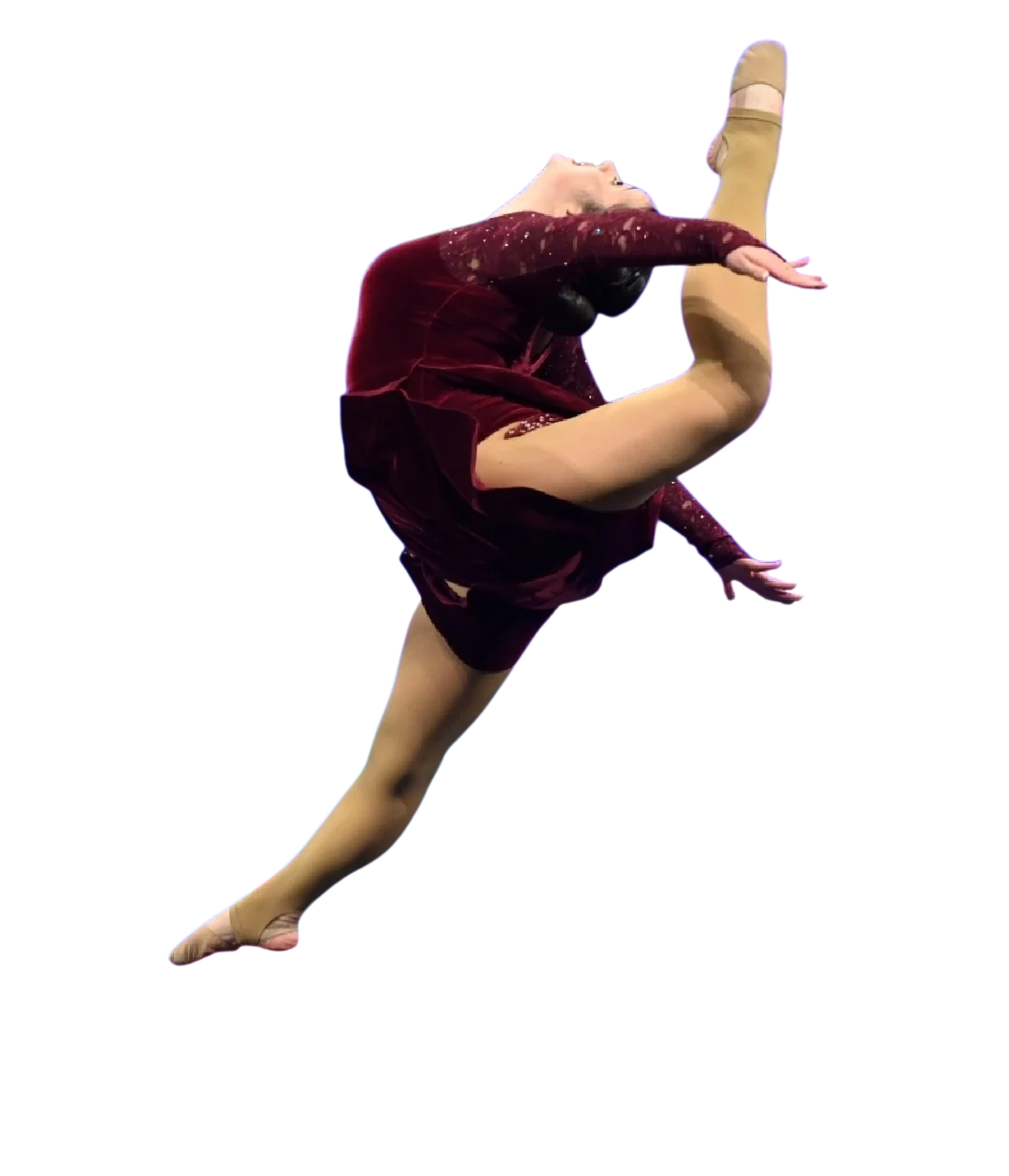 Be Famous Dance Center dancer in a maroon velvet costume mid-leap